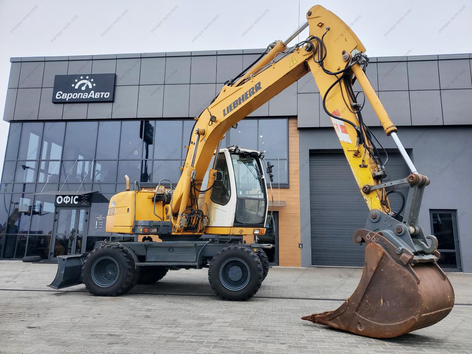 Liebherr A312 litronic Wheeled Full-Rotation - 1